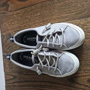 Sperry top sider gently worn women's shoes.Size 6. Sliver, sparkle with navy.